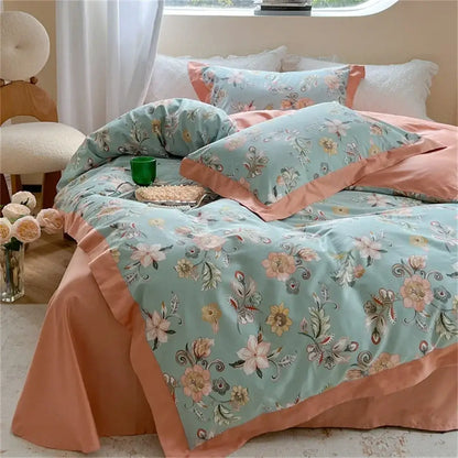 Pastel blue and peach floral bedding set with soft mint green accents and satin-like finish from decorbites colorful bedding