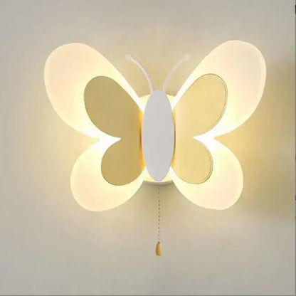 A decorbites butterfly girl room lamp featuring a soft white translucent butterfly wall sconce with warm illumination