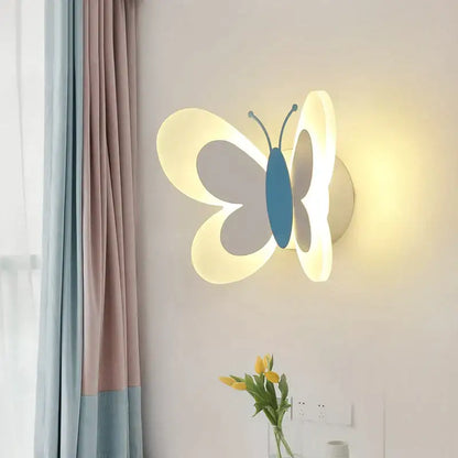 Pastel butterfly wall lamp with soft-glowing translucent white wings and solid blue body for kids bedroom decorbites butterfly wall lamp