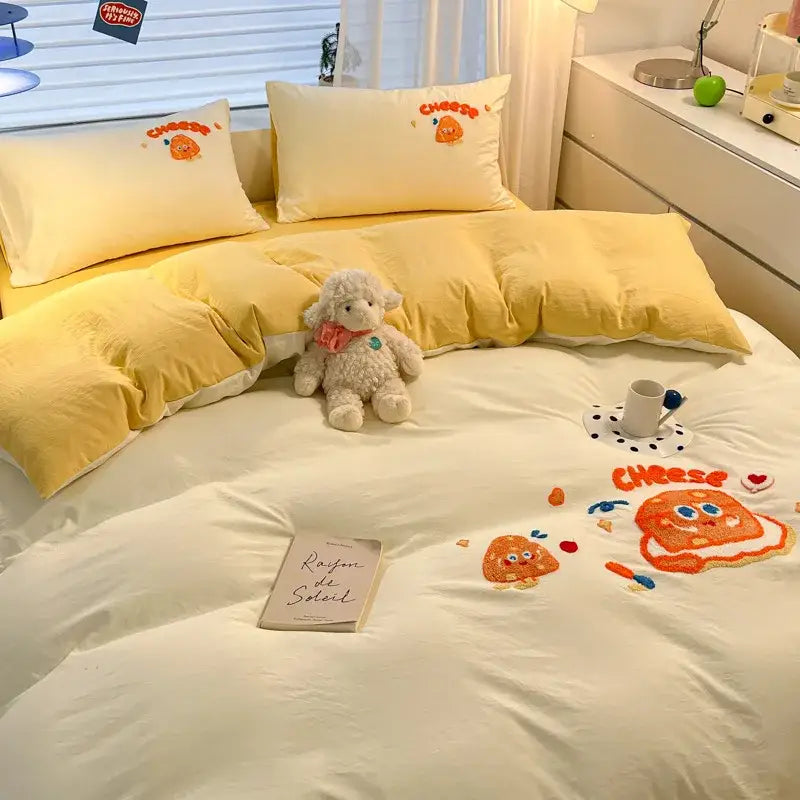 Pastel cartoon embroidered cotton bedding set with yellow cheese theme and orange accents for bedroom decorbites cartoon embroidered design