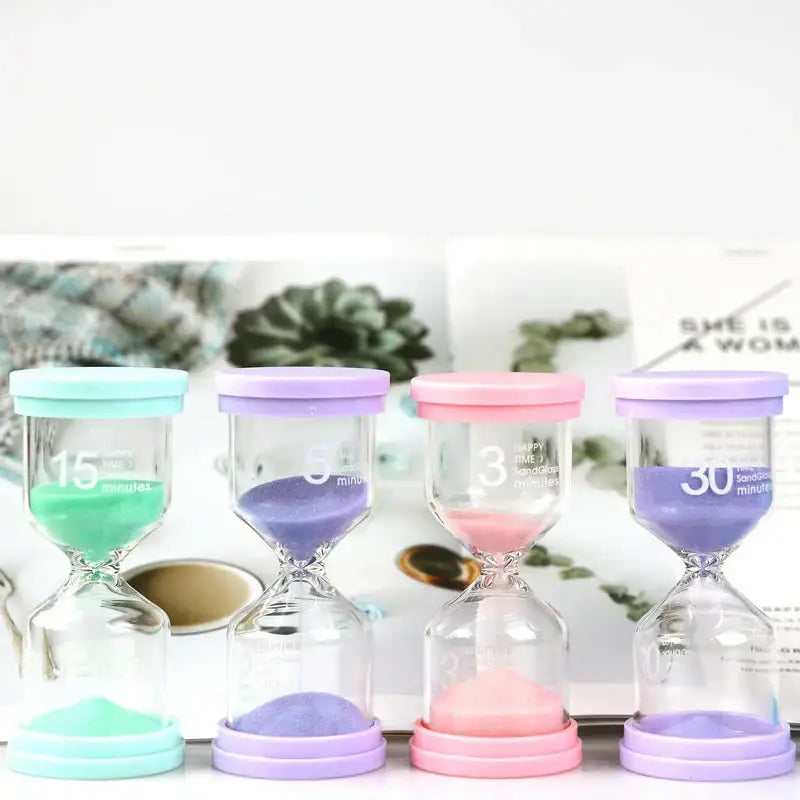 Set of four pastel colorful glass hourglass sand timers with silicone lids for kids bedroom decorbites hourglass sand timer