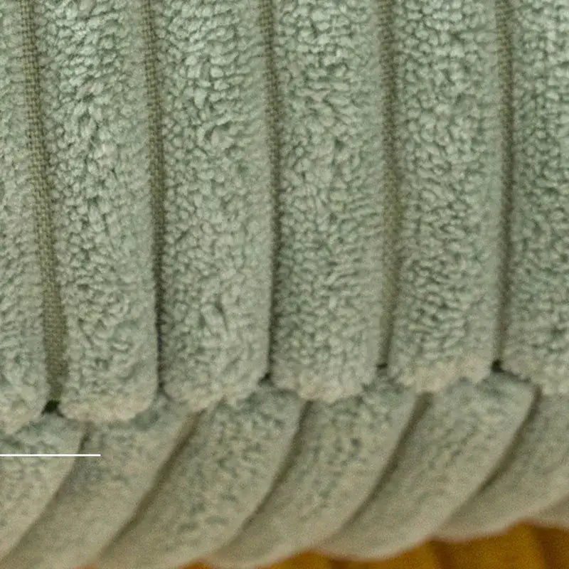 Light green decorbites corduroy striped body pillow with soft textured fabric and vertical ridges for lumbar support