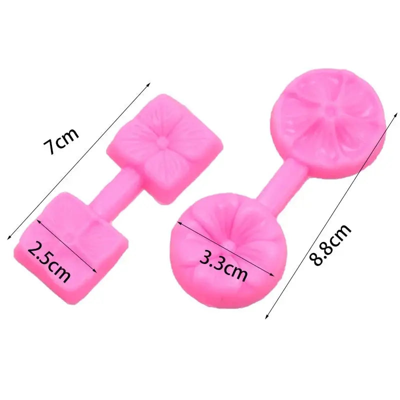 Pink silicone dumbbell-shaped baking molds with five petals flower design for kitchen use