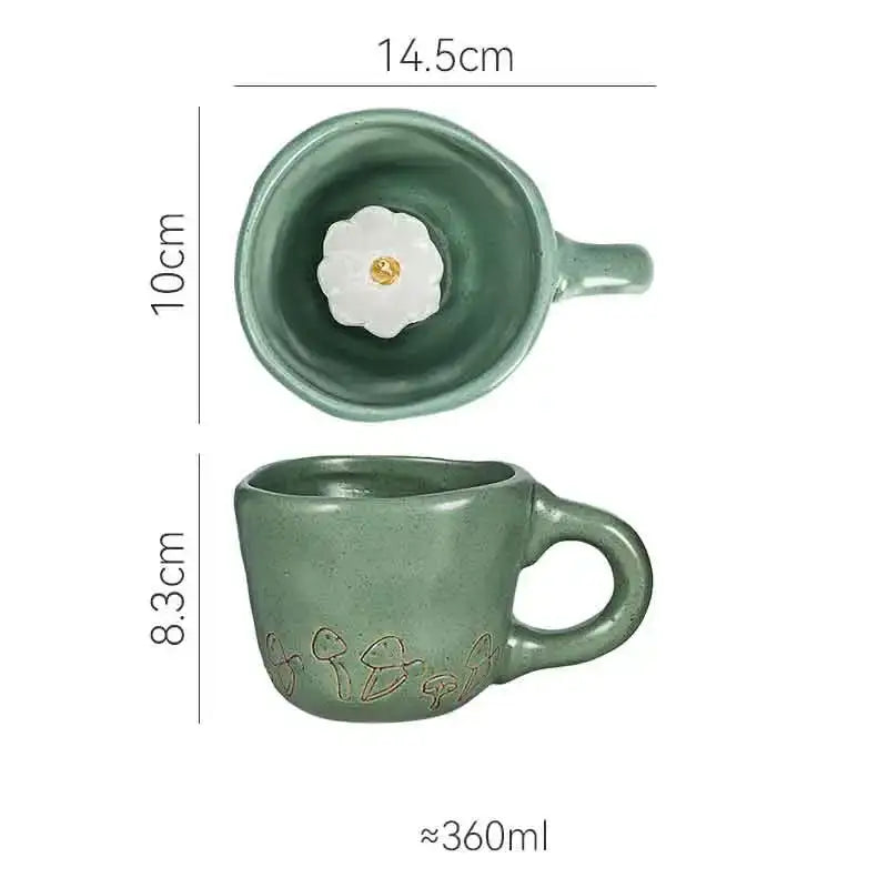 A matte sage green ceramic cartoon animal coffee mug with mushroom pattern and white flower interior from decorbites 3d cartoon set