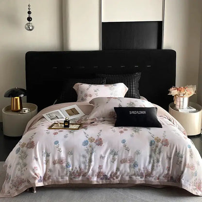 A soft pink satin bedding set with decorbites flowers prints featuring delicate pastel blossoms and butterflies
