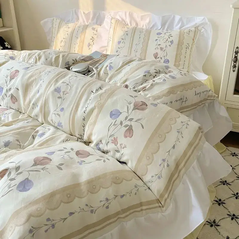 Cream-colored bedding set with delicate pastel blossoms and lace-trimmed borders from decorbites korean lace collection