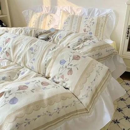 Cream-colored bedding set with delicate pastel blossoms and lace-trimmed borders from decorbites korean lace collection