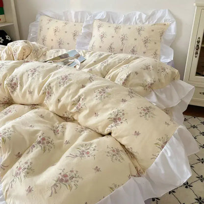 Cream-colored floral comforter set with delicate ruffled edges and soft quilted texture in decorbites korean lace bedding set