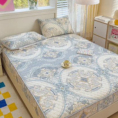 Blue and cream pastel floral quilted latex fitted sheet set featuring intricate floral designs for bedroom bed pad