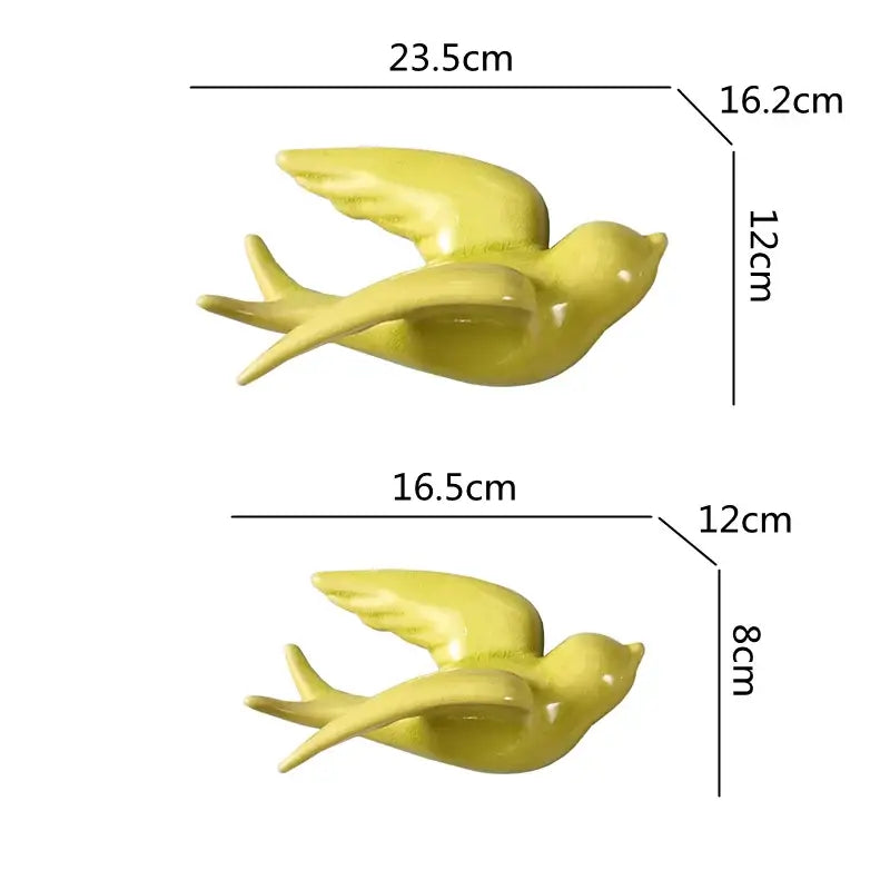 Yellow flying bird ceramic wall ornament with smooth glossy finish and detailed wing and tail design for living room decor