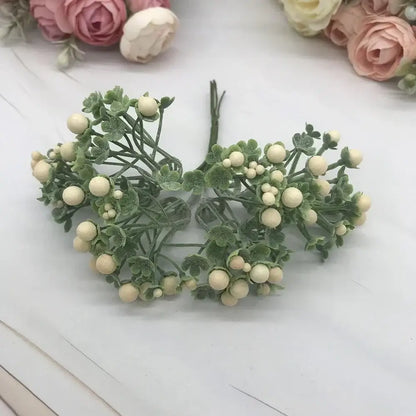 Artificial green and cream-colored berry cluster bouquet with textured leaves decorbites foam ball artificial flower set for living room decor