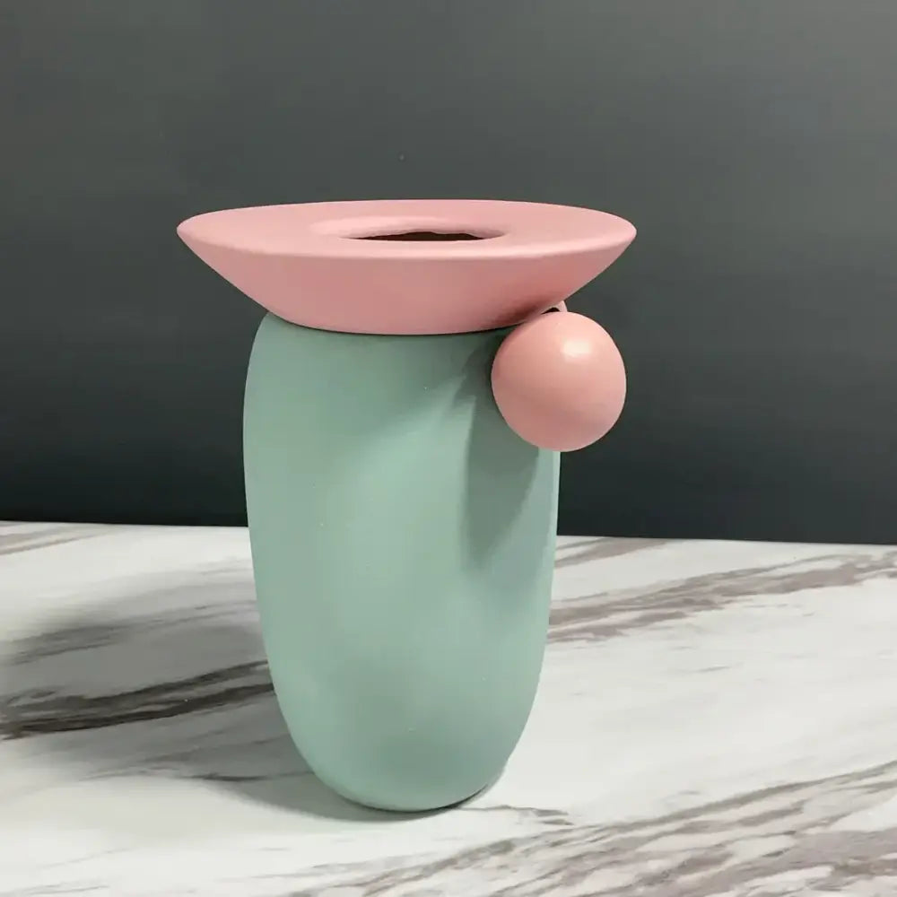 Pastel green geometric ball ceramic vase with pink circular lid and accent for decorbites geometric ball living room decor