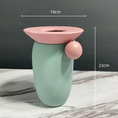 Pastel green geometric ball ceramic vase with pink flared rim and spherical accent for decorbites living room decor