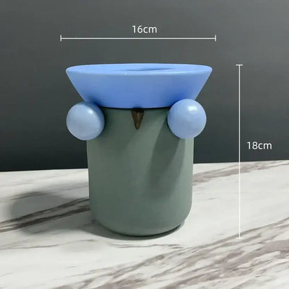 A mint green ceramic owl incense burner with light blue geometric ball ceramic bowl lid for decorbites geometric ball decor