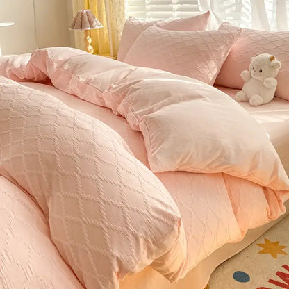 Pink quilted duvet cover featuring a soft textured diamond pattern from decorbites fresh bubble yarn bedding set