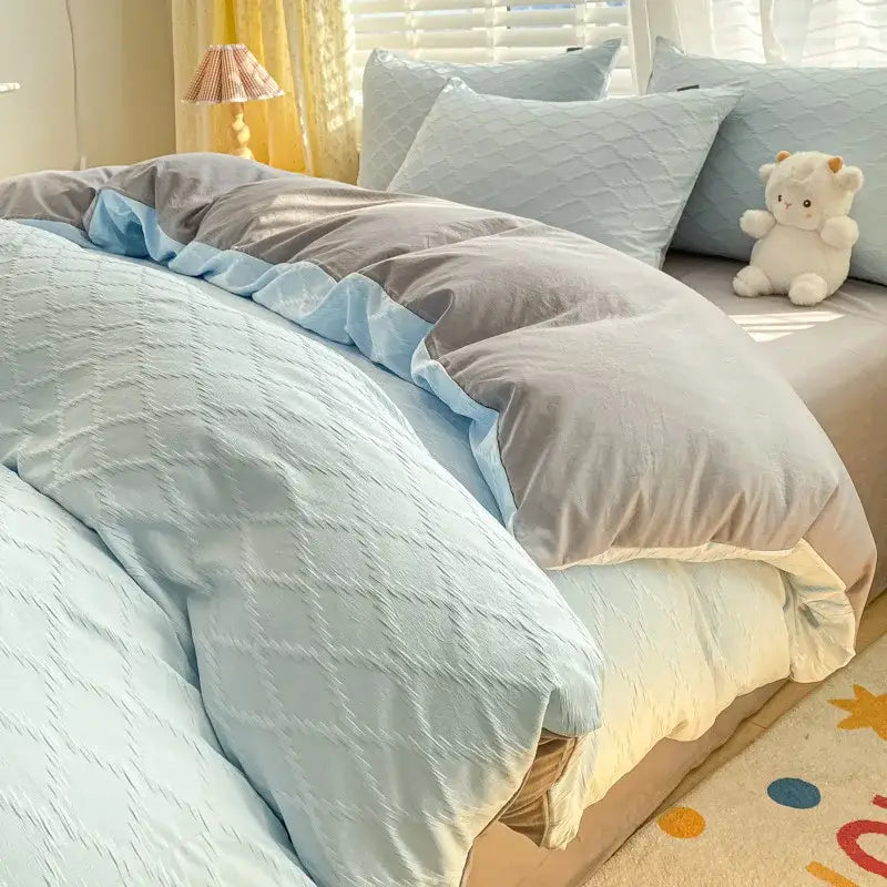 Light blue quilted duvet set with soft plush texture and gray accents from decorbites fresh bubble yarn bedding set