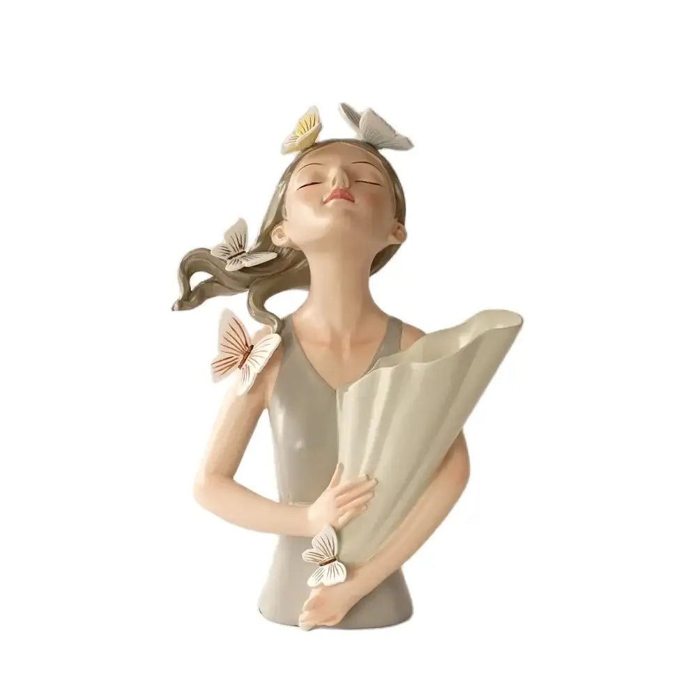 Beige ceramic butterfly girl vase statue with pastel green and peach butterflies holding a fan for living room decor