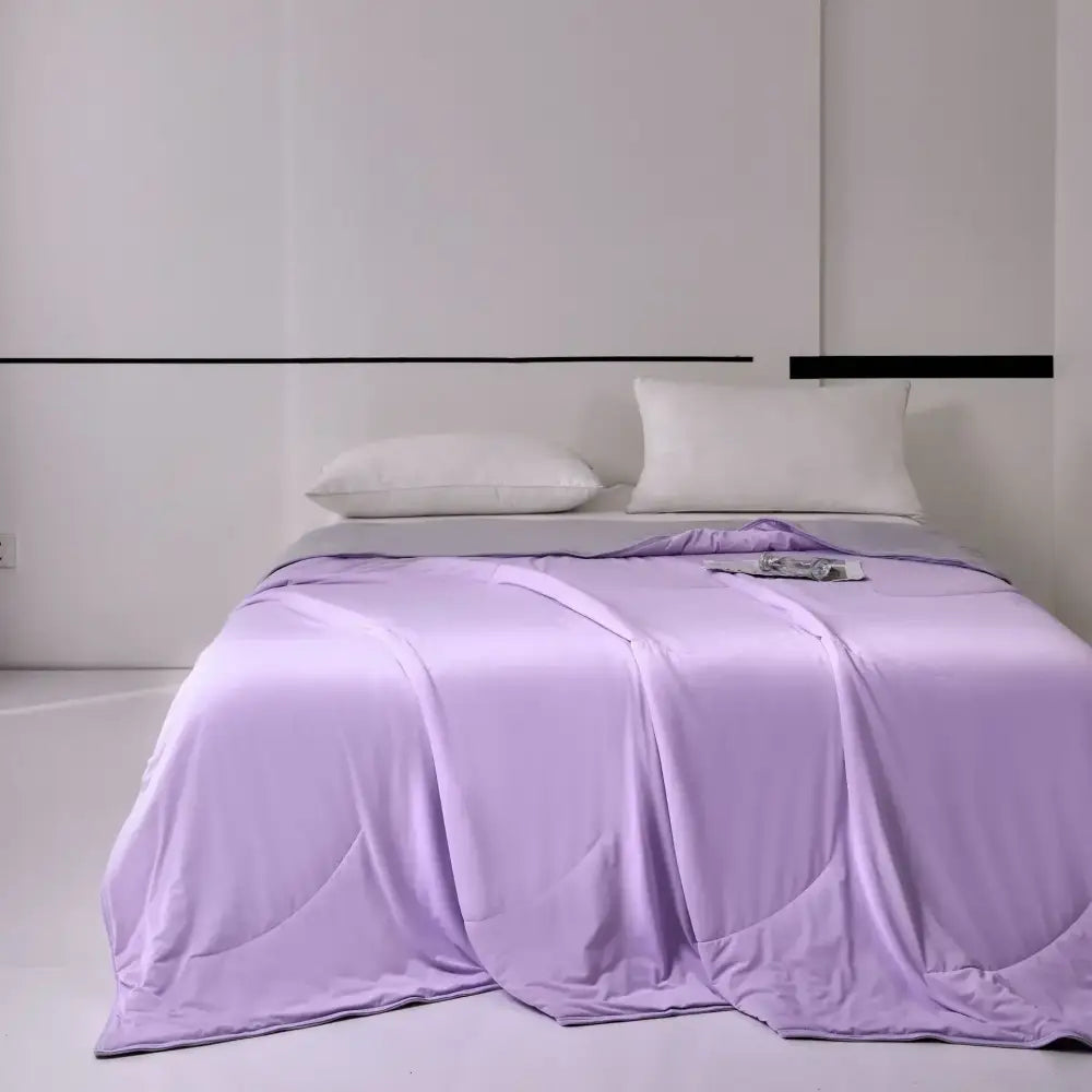 A soft lavender satin duvet cover with a glossy finish complements decorbites green summer cooling bedding