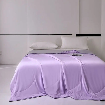A soft lavender satin duvet cover with a glossy finish complements decorbites green summer cooling bedding