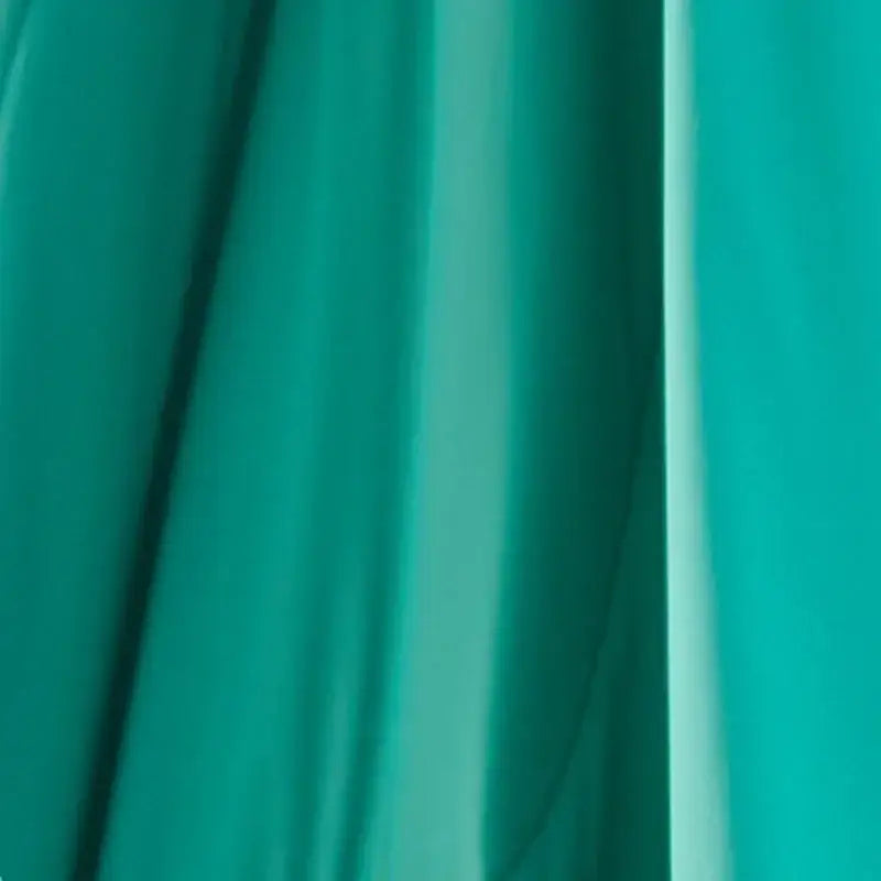 Pastel green summer cooling comforter with teal smooth fabric and gentle folds for decorbites green summer bedding