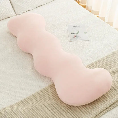 A pastel pink body-shaped plush pillow with a wavy ice cream design for decorbites bedroom decor