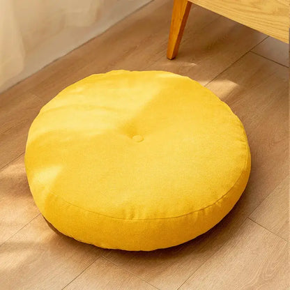 Bright yellow decorbites linen round floor cushion with soft plush fabric and central button for living room meditation use