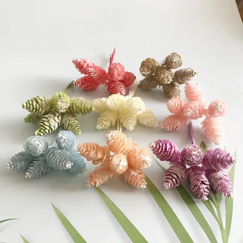Pastel pinecone artificial flower wreath featuring colorful clusters in pink green peach and purple for living room decor