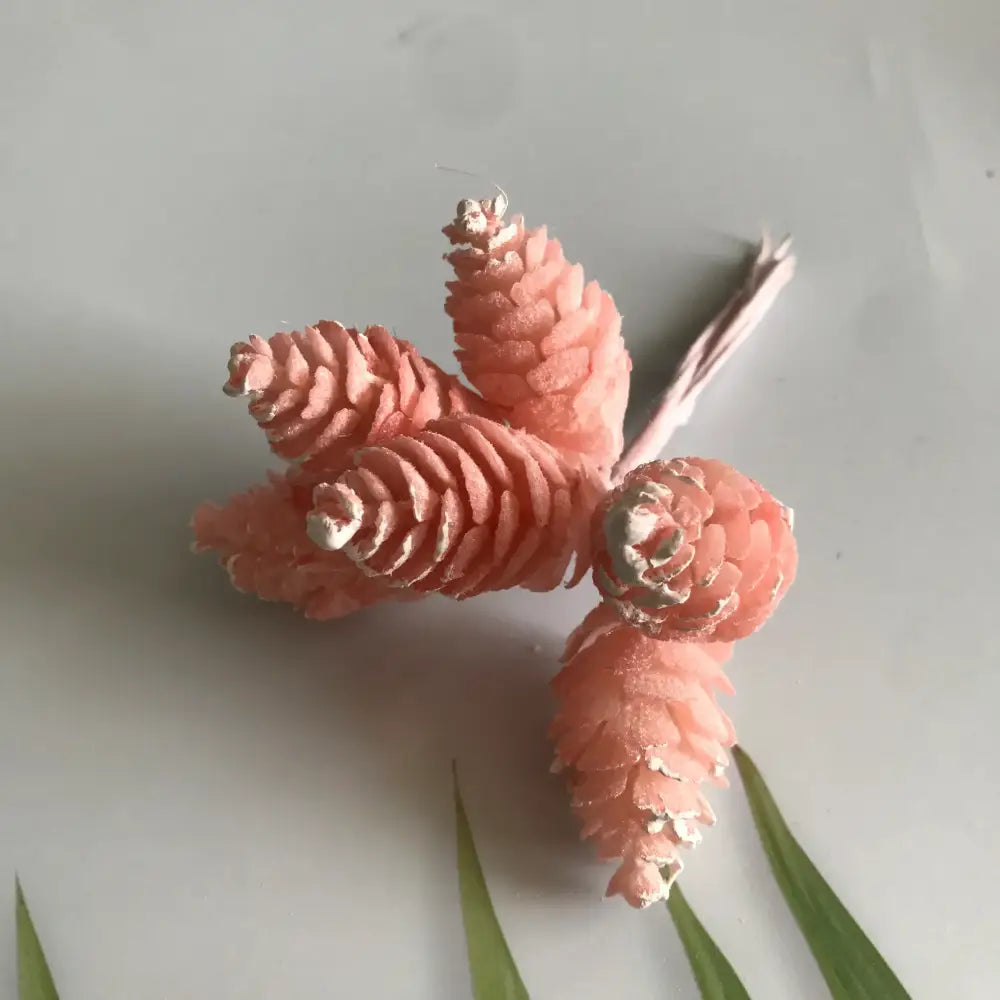 Pastel pinecone artificial flower wreath with pink glitter-frosted and silver metallic tips for living room decor