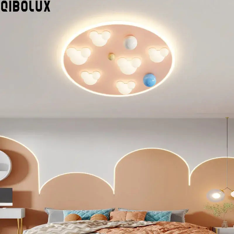 Pastel pink oval ceiling light with white and blue spherical accents for decorbites cloud shape ceiling bedroom decor