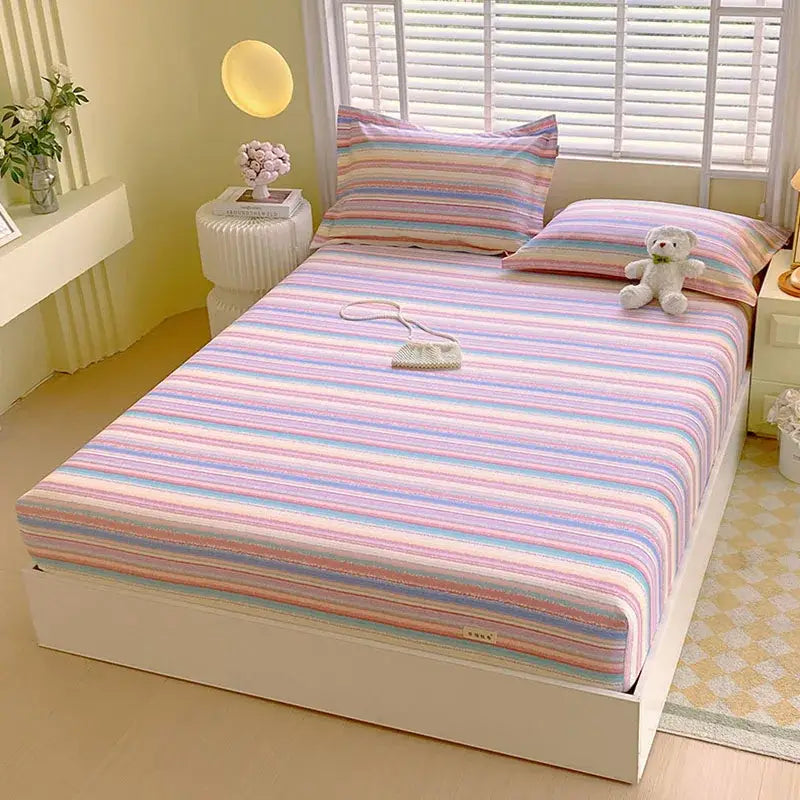 Pastel pink and blue cotton striped fitted sheet with gentle hues in horizontal stripes for bedroom decorbites bedding