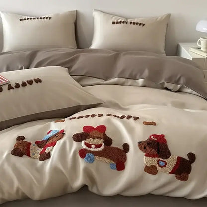 Cream-colored duvet cover with three plush embroidered puppies in brown and red from pastel pink cartoon embroidery cotton bedding set by decorbites