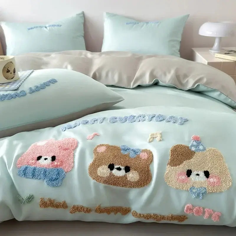 Mint green comforter with plush embroidered cartoon bear designs in pastel accents from pastel pink cartoon embroidery cotton bedding set by decorbites