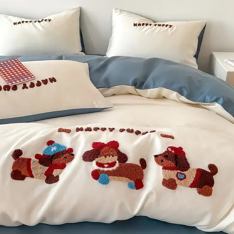 Pastel pink cartoon embroidery cotton bedding set with white duvet cover featuring three embroidered fluffy brown puppies in festive outfits