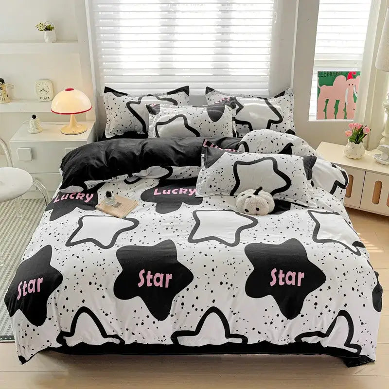 Black and white star-patterned bedding set with pink star and lucky text accents made of decorbites cozy cotton material