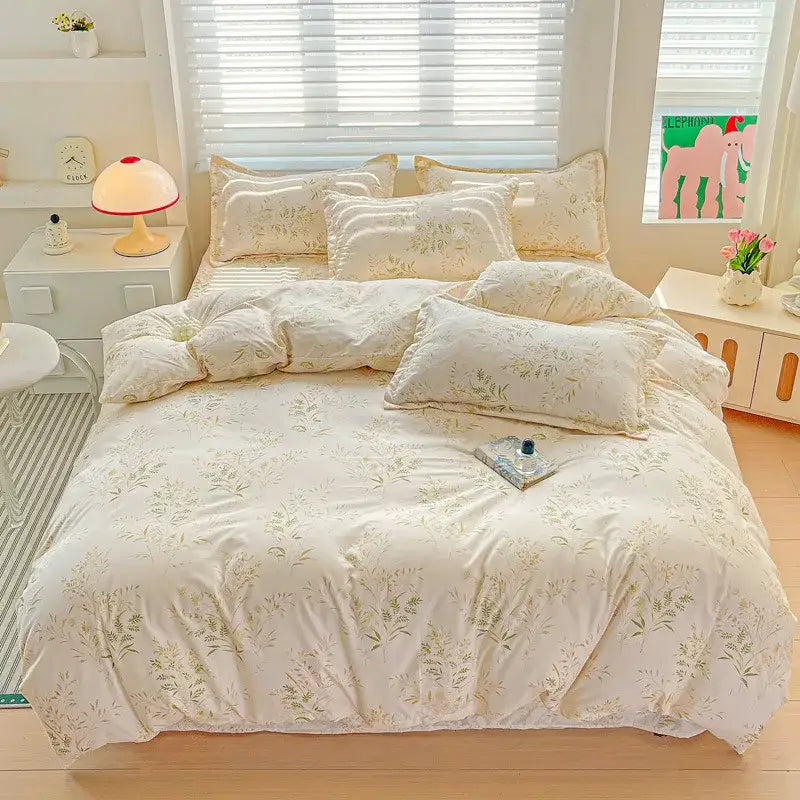 Cream-colored cozy cotton bedding set with delicate green floral embroidery in decorbites cozy cotton style