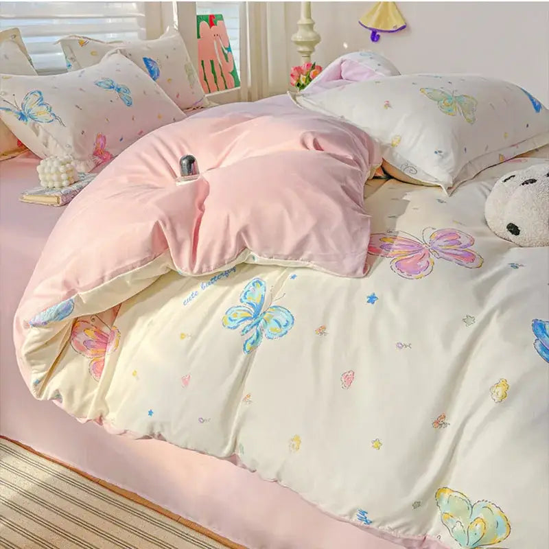 Pastel pink and cream butterfly-themed bedding set made of decorbites cozy cotton with soft plush fabric