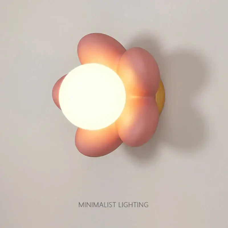 Pastel pink cream flower wall lamp with glowing white circular light for bedroom lighting decorbites cream flower decor