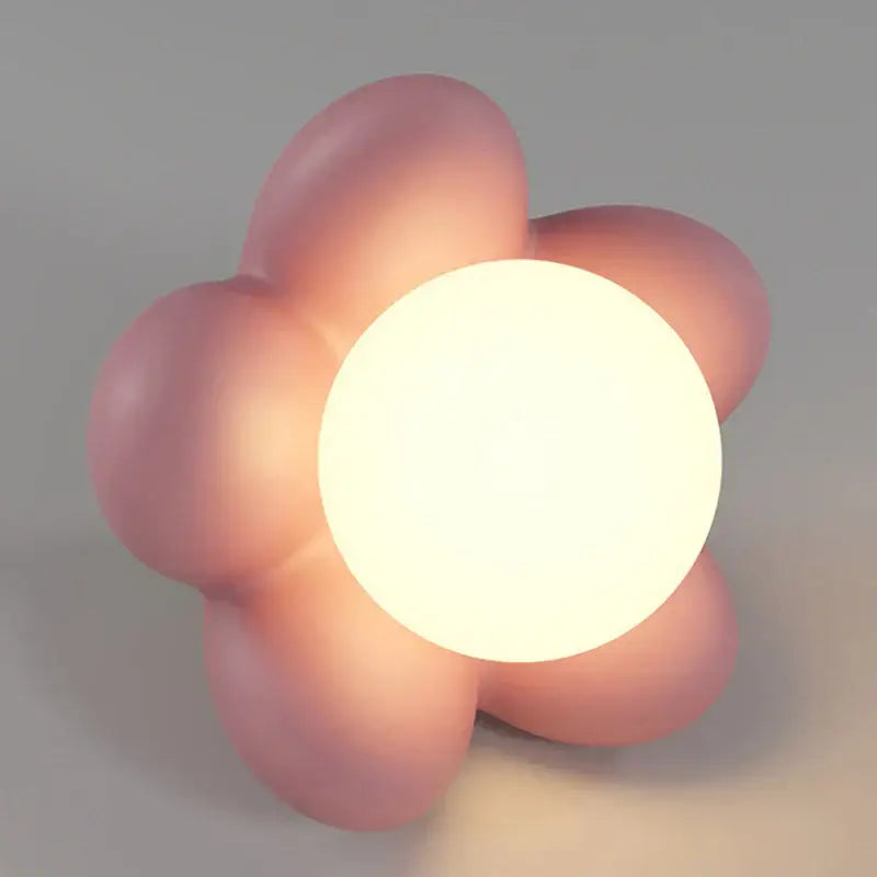 Pastel pink cream flower wall lamp with glowing white center for bedroom lighting by decorbites cream flower wall decor