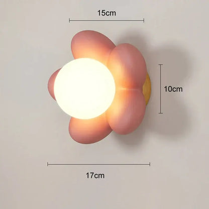 Pastel pink and yellow decorbites cream flower wall lamp with glowing white center for bedroom lighting decorbites cream flower