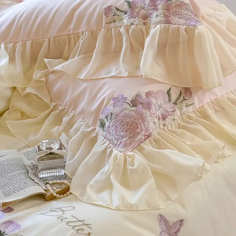 Cream-colored satin bedding set with ruffled edges and delicate lavender flowers lace embroidery for bedroom decor