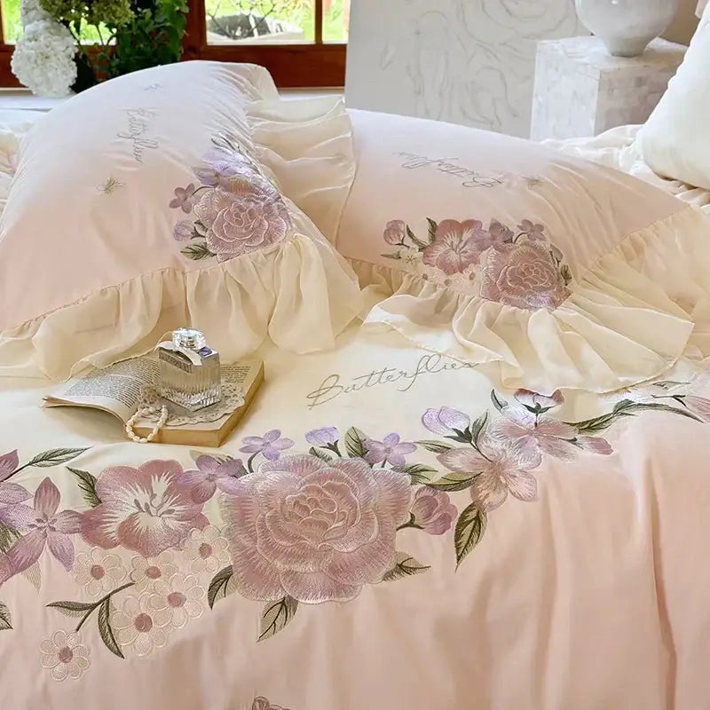 Pastel pink bedding set with floral embroidery flowers lace ruffles and delicate lace trim for elegant bedroom decorbites decor