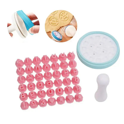 Pastel pink and yellow decorbites cookie stamps set with pink plastic letters and symbols and light blue base