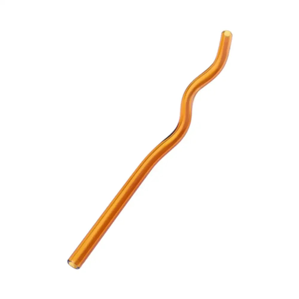 A translucent amber decorbites glass straw with smooth curved design from pastel ridged glass straws set for eco friendly use