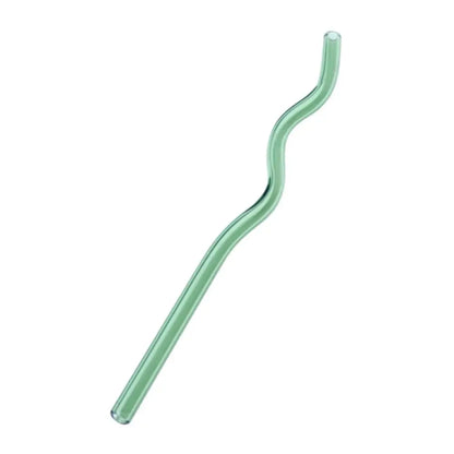 A translucent mint-green decorbites glass straw with a smooth wavy design from a pastel ridged glass straws set