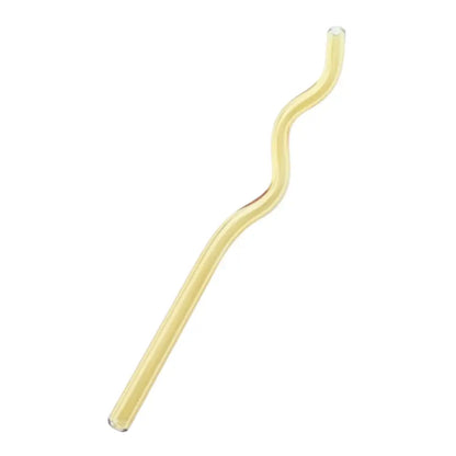 A translucent yellow glass straw with a smooth wavy design from the decorbites glass straws set for eco friendly use