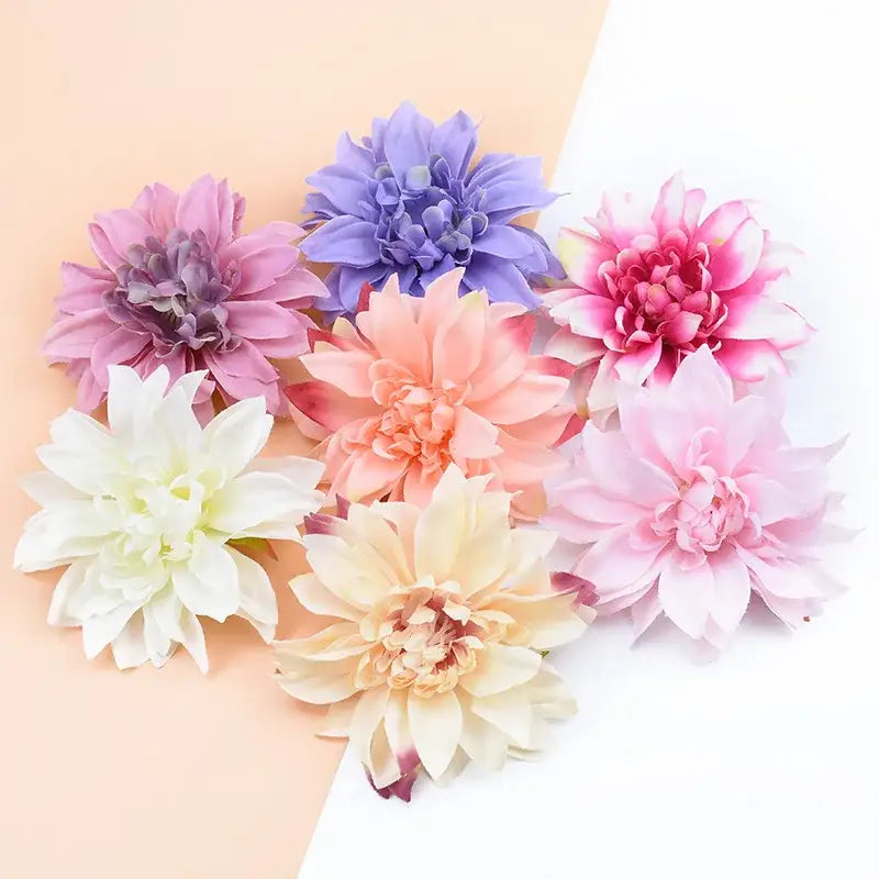 A collection of pastel silk gerbera decorative flowers in pink lavender peach and white for wedding home decor