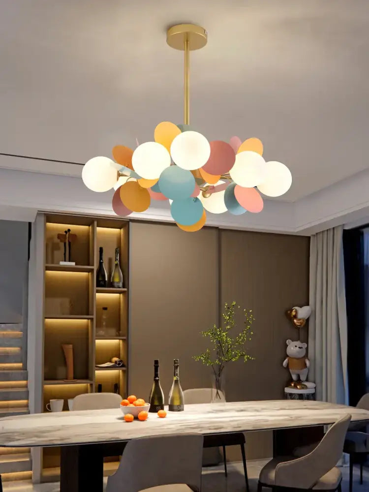 Pastel spherical colorful chandelier pendant lamp with balloon-shaped lights and gold-toned rod for dining room decorbites colorful chandelier