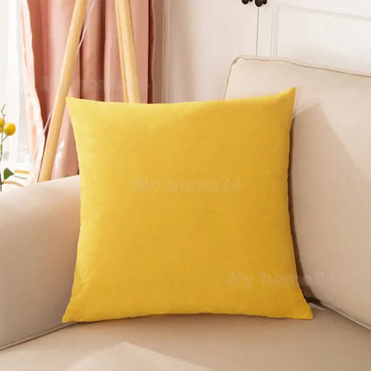 Bright yellow velvet pillow cover with soft plush fabric texture as part of a pastel pillow cover set for living room decor