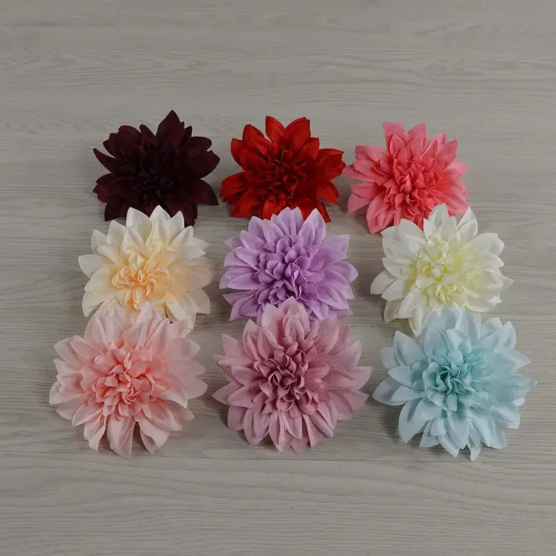A pastel woolen chrysanthemum wreath bouquet with artificial dahlia flowers in vibrant hues for wedding decoration