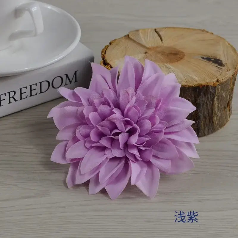 A delicate light purple woolen chrysanthemum wreath bouquet with layered petals for wedding decoration